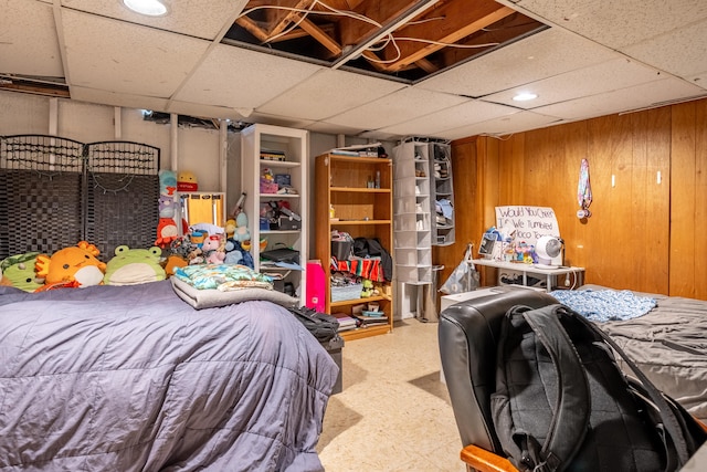 bedroom featuring a drop ceiling and recessed lighting