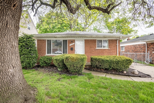 ranch-style home with brick siding