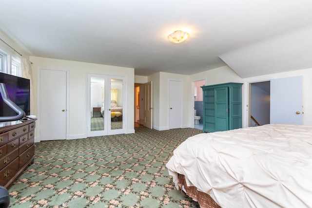 bedroom featuring french doors, carpet flooring, baseboards, and ensuite bathroom