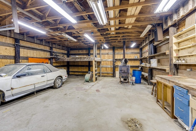 garage with a workshop area