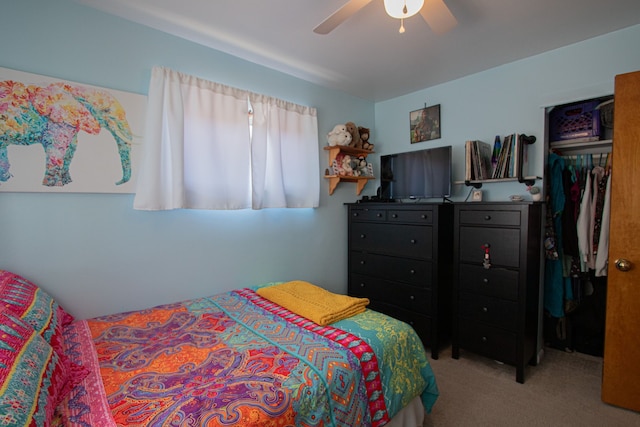 bedroom with a closet, carpet flooring, and ceiling fan