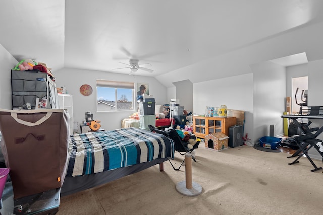 bedroom featuring carpet floors, ceiling fan, and lofted ceiling