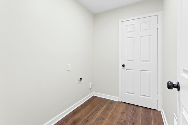 washroom featuring laundry area, hookup for an electric dryer, baseboards, and dark wood-style flooring