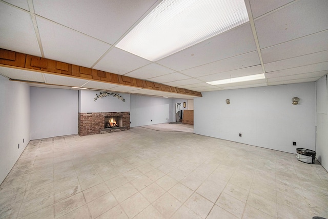 2771 Park Dr, Adrian, MI 49221 - finished basement featuring a paneled ceiling and a fireplace