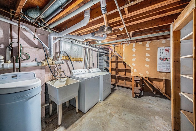 2771 Park Dr, Adrian, MI 49221 - unfinished below grade area featuring washing machine and dryer and a sink