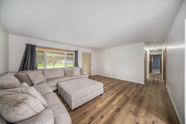 2771 Park Dr, Adrian, MI 49221 - living room featuring baseboards and wood finished floors