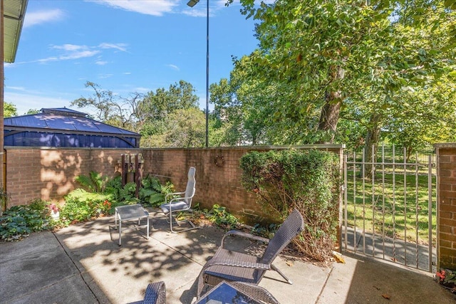 view of patio with a fenced backyard