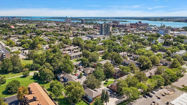 aerial view featuring a water view and a view of city