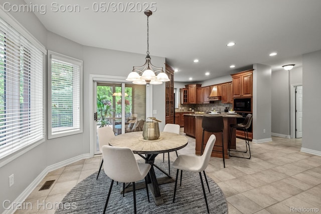 1171 Deer Path Trl, Oxford, MI 48371 - dining space with a chandelier, recessed lighting, light tile patterned floors, and baseboards