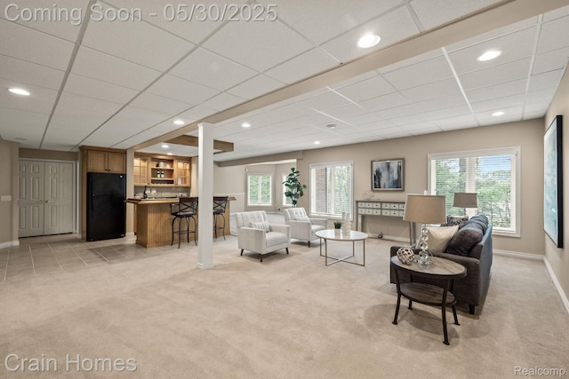 1171 Deer Path Trl, Oxford, MI 48371 - living room with light colored carpet, baseboards, healthy amount of natural light, recessed lighting, and a paneled ceiling