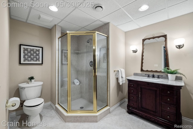 1171 Deer Path Trl, Oxford, MI 48371 - bathroom featuring toilet, vanity, tile patterned flooring, a shower stall, and a drop ceiling