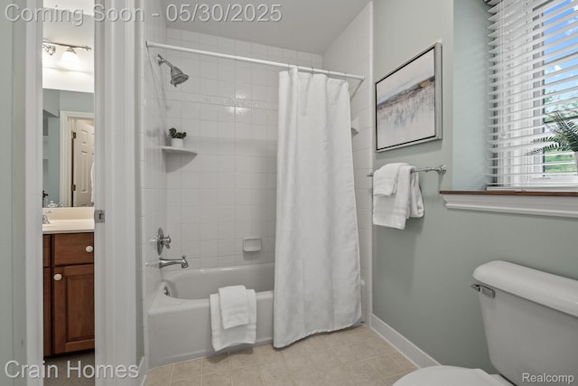 1171 Deer Path Trl, Oxford, MI 48371 - bathroom featuring toilet, vanity, shower / tub combo with curtain, and baseboards