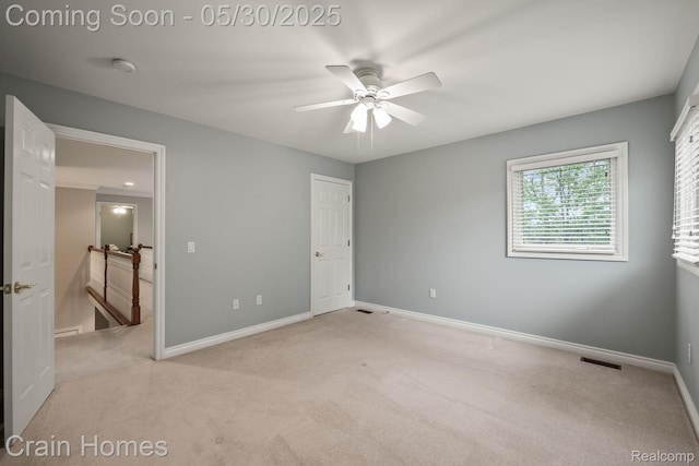 1171 Deer Path Trl, Oxford, MI 48371 - unfurnished bedroom with light colored carpet, baseboards, and a ceiling fan
