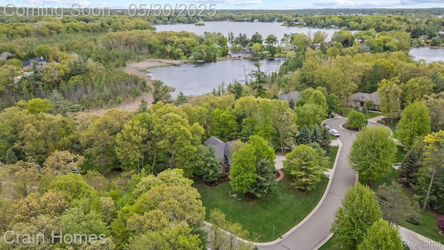 1171 Deer Path Trl, Oxford, MI 48371 - view of property location featuring a large body of water and a heavily wooded area