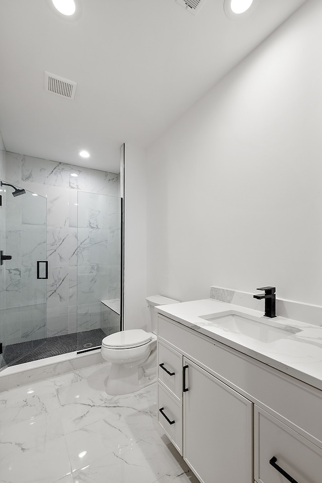 full bathroom with a marble finish shower, vanity, marble finish floor, toilet, and visible vents