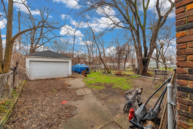 16171 Ilene St, Detroit, MI 48221 - view of yard featuring a fenced backyard, a garage, and an outdoor structure