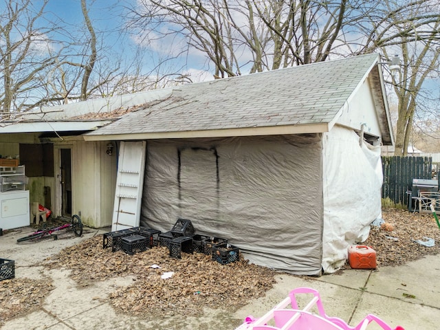 19965 Barlow St, Detroit, MI 48205 - view of outbuilding featuring fence and an outbuilding