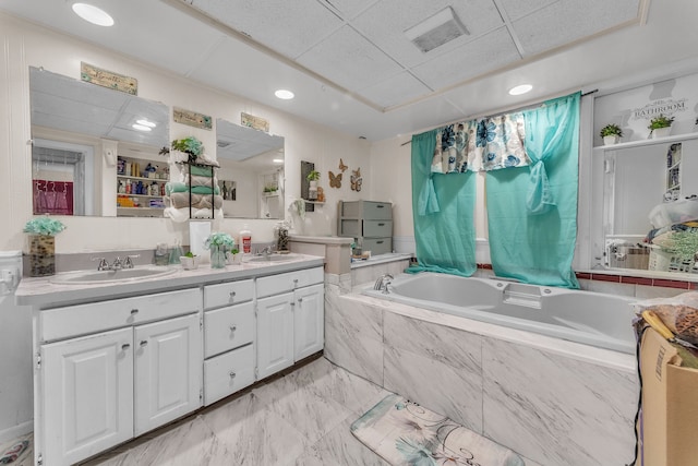 19965 Barlow St, Detroit, MI 48205 - full bathroom featuring double vanity, a garden tub, visible vents, and a sink