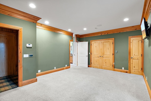 unfurnished bedroom with carpet, recessed lighting, and baseboards