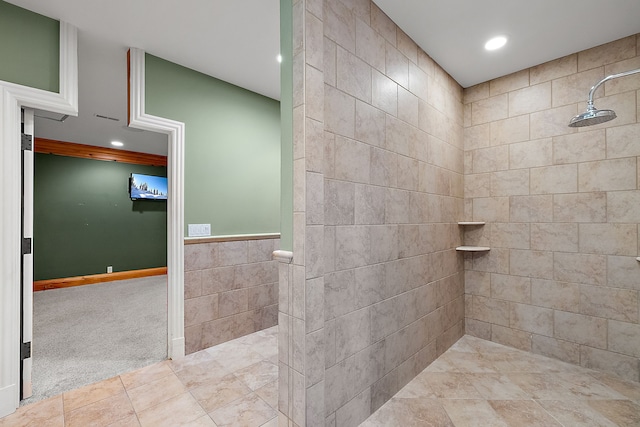 full bath with recessed lighting and a tile shower