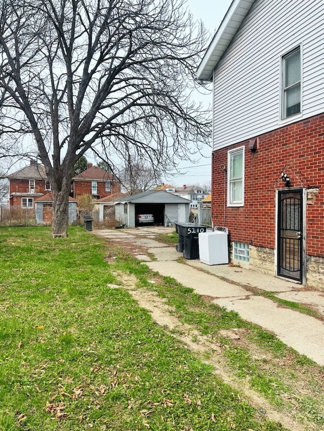 exterior space with an outdoor structure and a detached carport