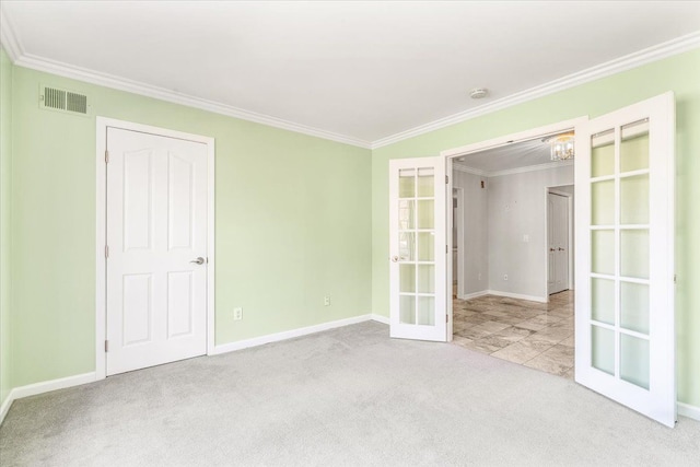 775 Deer Ct, Plymouth, MI 48170 - empty room featuring crown molding, french doors, carpet flooring, and visible vents