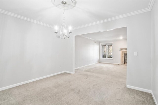 775 Deer Ct, Plymouth, MI 48170 - empty room featuring a chandelier, baseboards, light carpet, and ornamental molding