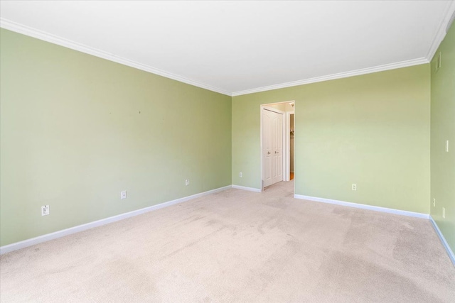 775 Deer Ct, Plymouth, MI 48170 - spare room featuring crown molding, baseboards, and light carpet