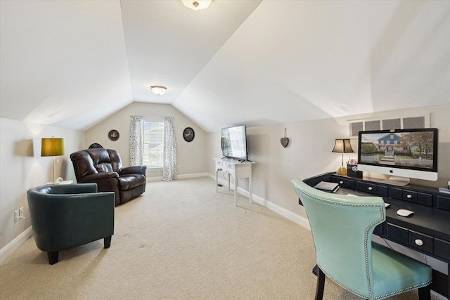 office space featuring baseboards, visible vents, carpet flooring, and lofted ceiling