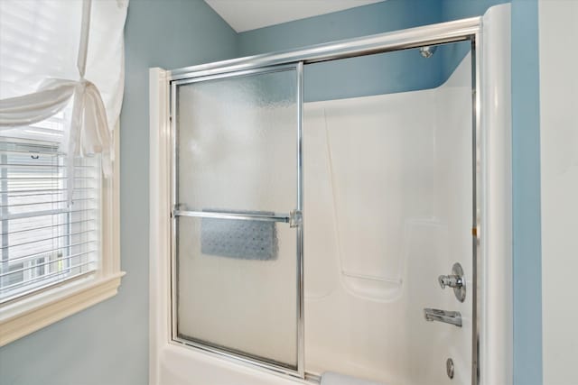 full bath featuring enclosed tub / shower combo