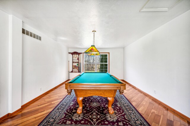 57480 72nd Ave, Hartford, MI 49057 - rec room featuring visible vents, baseboards, billiards, and wood finished floors