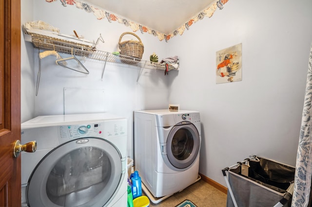 57480 72nd Ave, Hartford, MI 49057 - laundry room with washing machine and dryer and laundry area