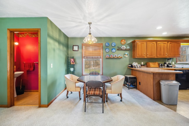 57480 72nd Ave, Hartford, MI 49057 - dining space with recessed lighting, light colored carpet, and baseboards
