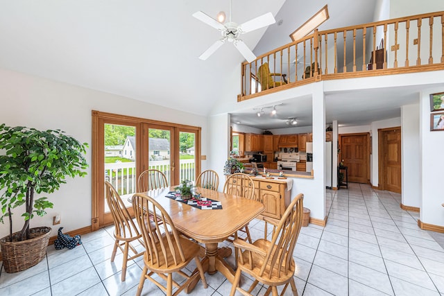 5095 Bliss Ln, Newaygo, MI 49337 - dining space with baseboards, high vaulted ceiling, and ceiling fan