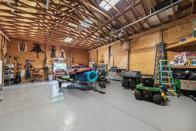 5095 Bliss Ln, Newaygo, MI 49337 - garage featuring a workshop area