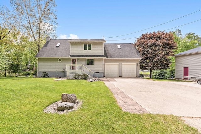 5095 Bliss Ln, Newaygo, MI 49337 - view of front of home with a front yard, an attached garage, crawl space, a chimney, and driveway