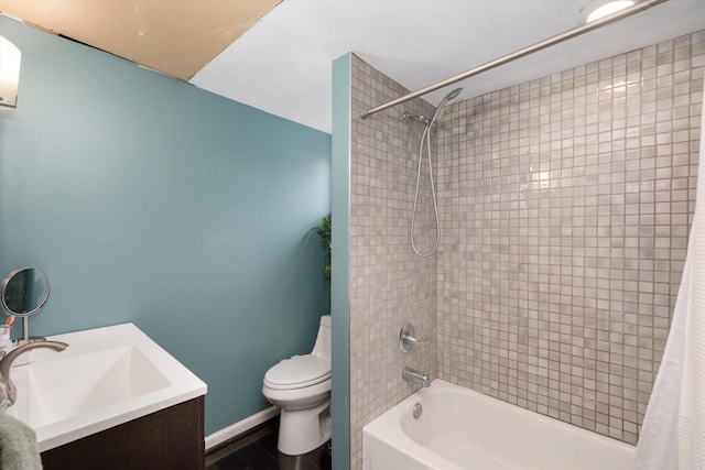full bathroom featuring shower / tub combo, vanity, and toilet
