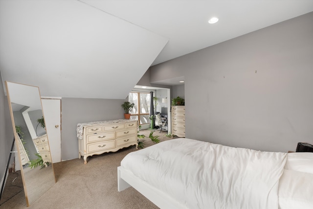 bedroom featuring light carpet and recessed lighting