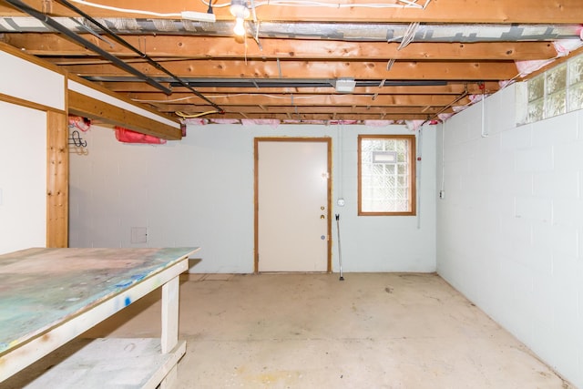 below grade area with concrete block wall