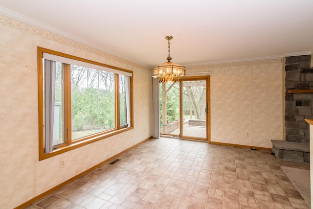 unfurnished dining area with wallpapered walls, an inviting chandelier, baseboards, and visible vents