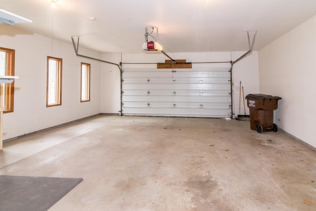 garage featuring a garage door opener