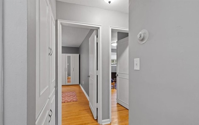 hall featuring light wood-style floors