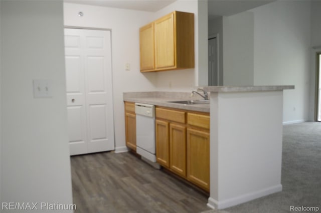 12201 Pinehurst Ln, Grand Blanc, MI 48439 - kitchen with white dishwasher, a sink, baseboards, light countertops, and light brown cabinets