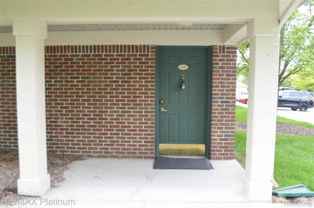 12201 Pinehurst Ln, Grand Blanc, MI 48439 - property entrance featuring brick siding
