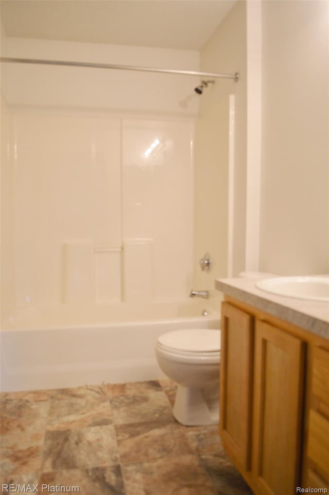 12201 Pinehurst Ln, Grand Blanc, MI 48439 - bathroom with vanity, toilet, and shower / bathtub combination