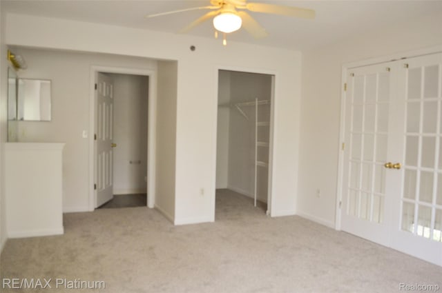 12201 Pinehurst Ln, Grand Blanc, MI 48439 - unfurnished bedroom with carpet floors, baseboards, and ceiling fan