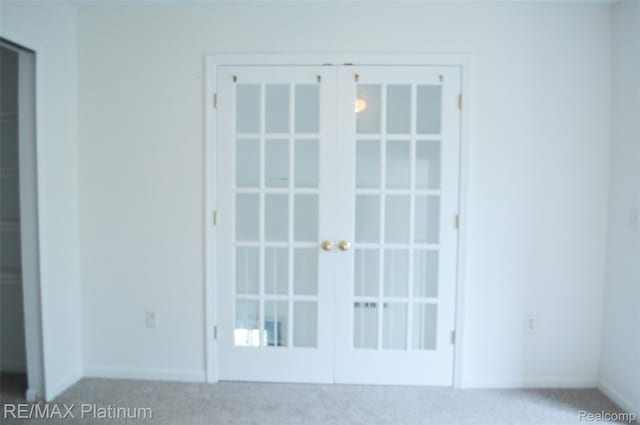 12201 Pinehurst Ln, Grand Blanc, MI 48439 - carpeted spare room featuring french doors and baseboards