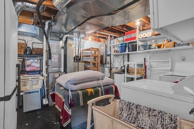 unfinished basement featuring separate washer and dryer