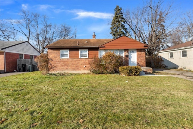 24241 Coolidge, Oak Park, MI 48237 - back of property featuring a chimney, brick siding, and a lawn
