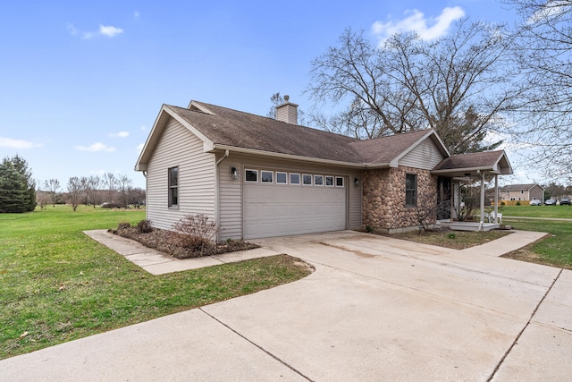 view of side of property featuring a yard, stone siding, a garage, a chimney, and driveway